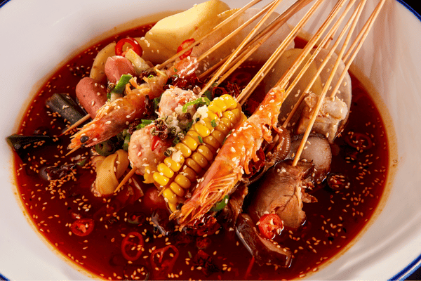 Hạn chế các món ăn có nhiều dầu mỡ và cay nóng