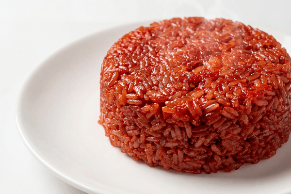 Xôi gấc được xem là biểu tượng của may mắn, phú quý